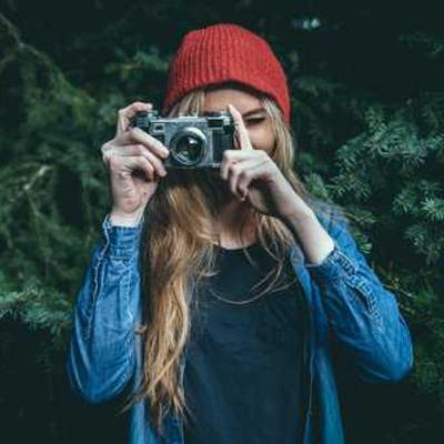 a women with a camera